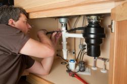 Treck is one of our Fairfield plumbing pros and he is repairing a garbage disposal
